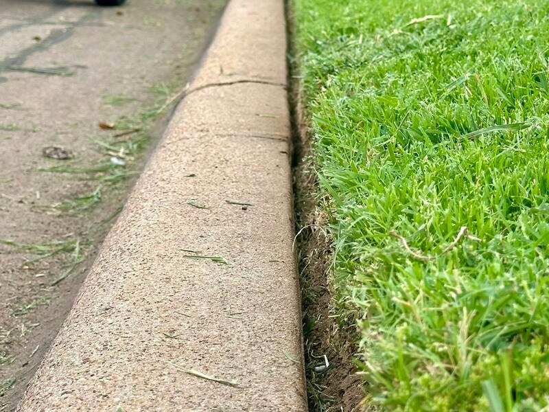 Close-up of a freshly cut lawn edge, Abilene, TX